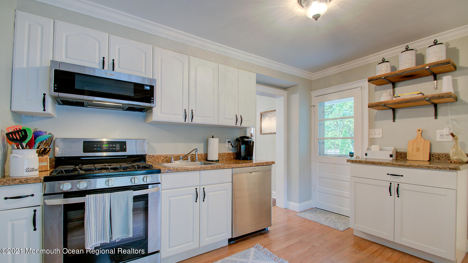 10 Cherry Tree Farm Road Middletown, NJ 07748 - Photo 17 of 43 a kitchen with stainless steel appliances granite countertop a sink and a stove