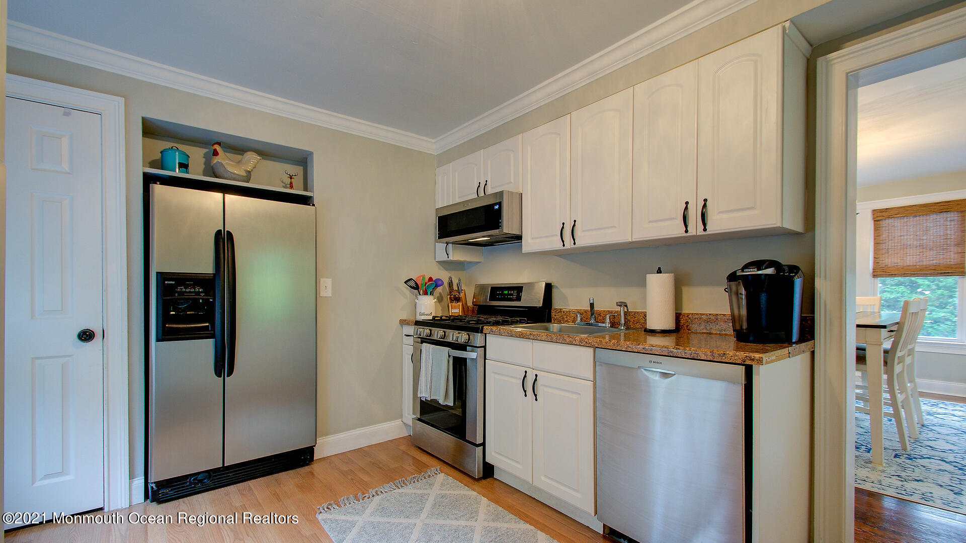 10 Cherry Tree Farm Road Middletown, NJ 07748 - Photo 18 of 43 a kitchen with stainless steel appliances granite countertop a refrigerator a stove a sink and a microwave