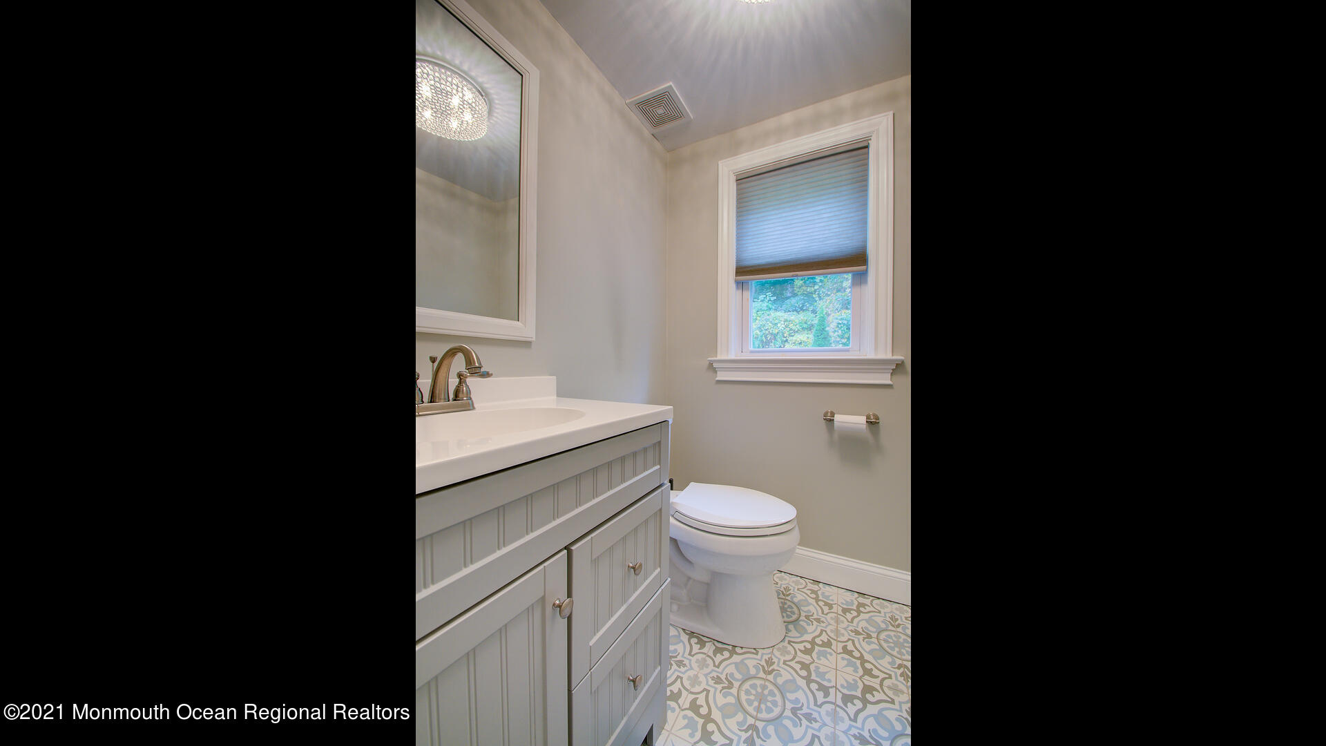 10 Cherry Tree Farm Road Middletown, NJ 07748 - Photo 25 of 43 a bathroom with a granite countertop toilet a sink and a window