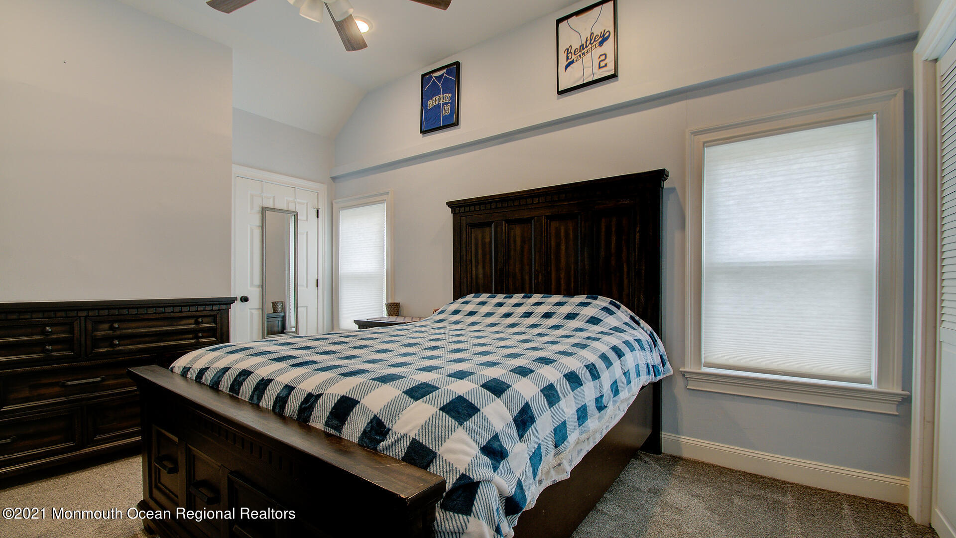 10 Cherry Tree Farm Road Middletown, NJ 07748 - Photo 29 of 43 a bedroom with a bed and a dresser