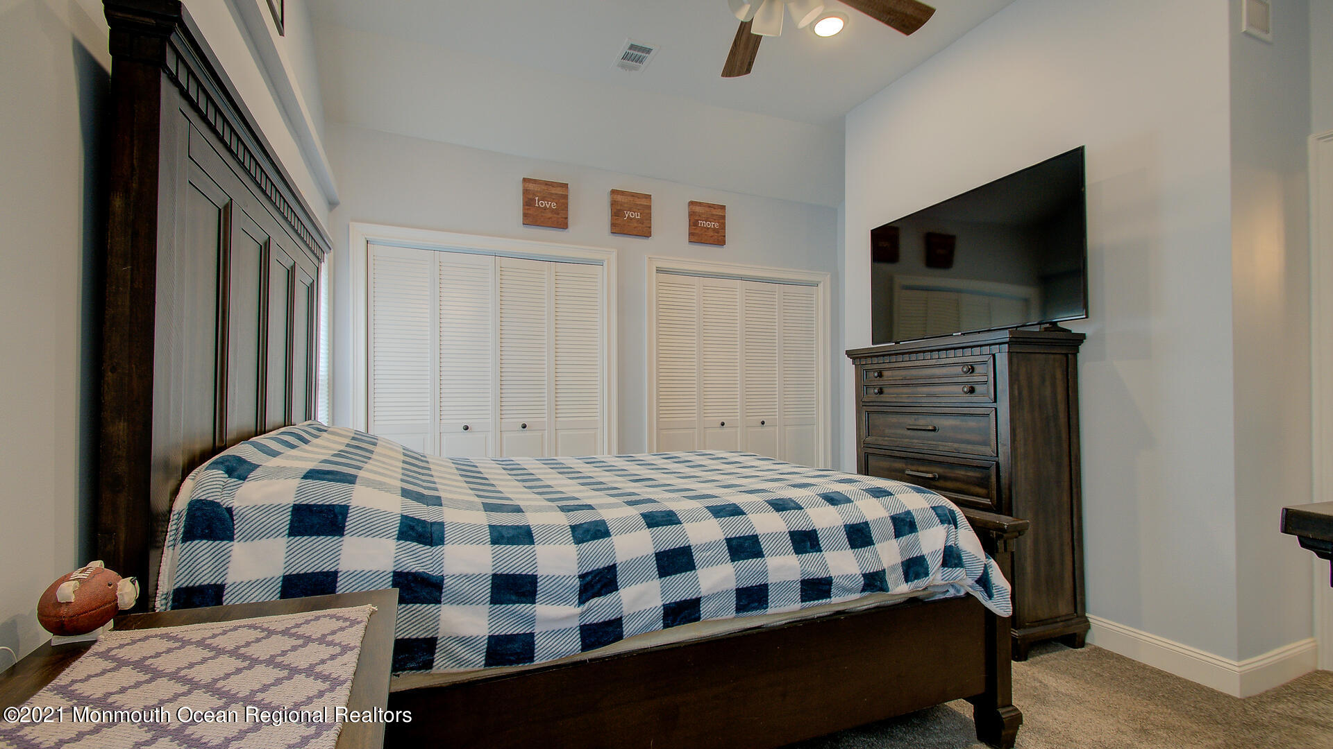10 Cherry Tree Farm Road Middletown, NJ 07748 - Photo 30 of 43 a bedroom with bed and flat screen tv