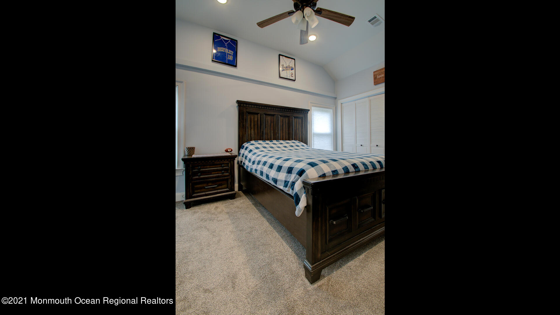 10 Cherry Tree Farm Road Middletown, NJ 07748 - Photo 31 of 43 a bedroom with a bed and a fireplace