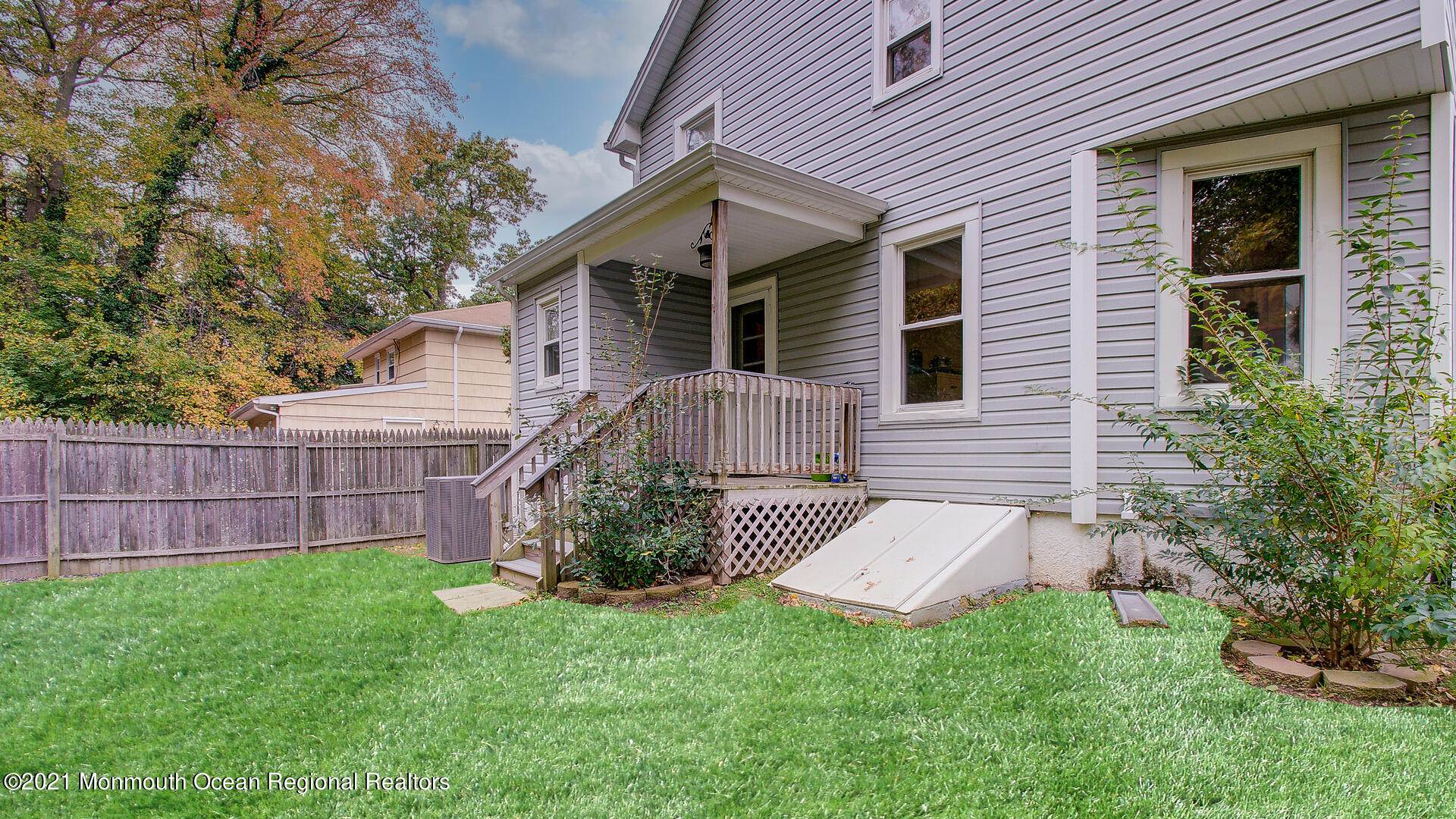 10 Cherry Tree Farm Road Middletown, NJ 07748 - Photo 40 of 43 a view of a house with a yard and a garden