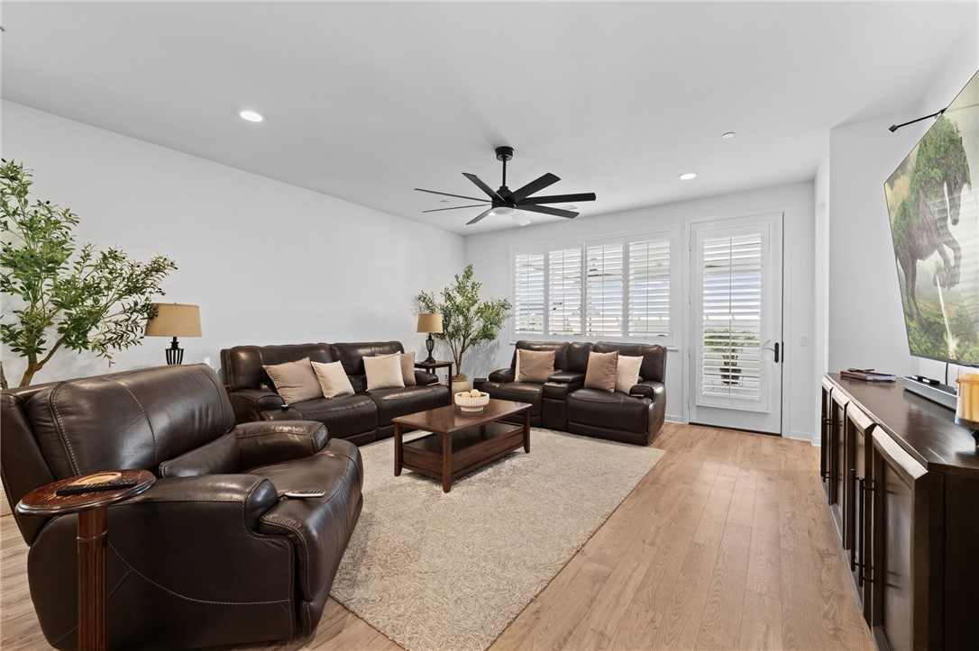 36938 Frantoio Street Beaumont, CA 92223 - Photo 15 of 35 a living room with furniture and a large window