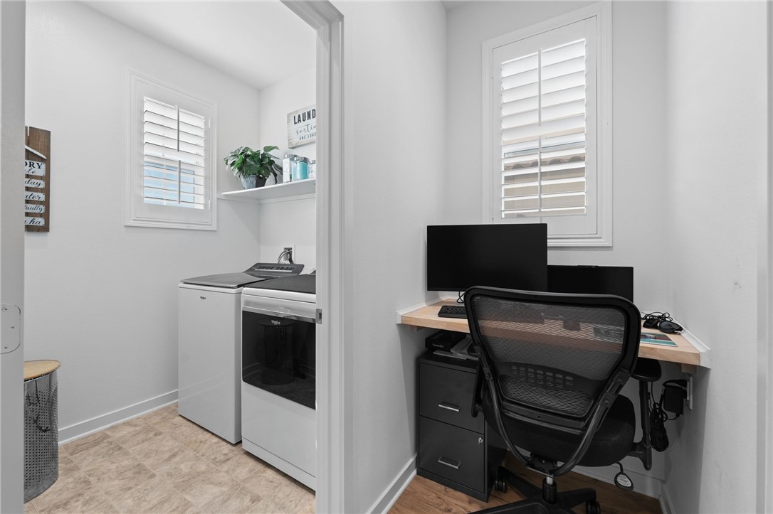 36938 Frantoio Street Beaumont, CA 92223 - Photo 30 of 35 a view of a workspace with furniture and a window