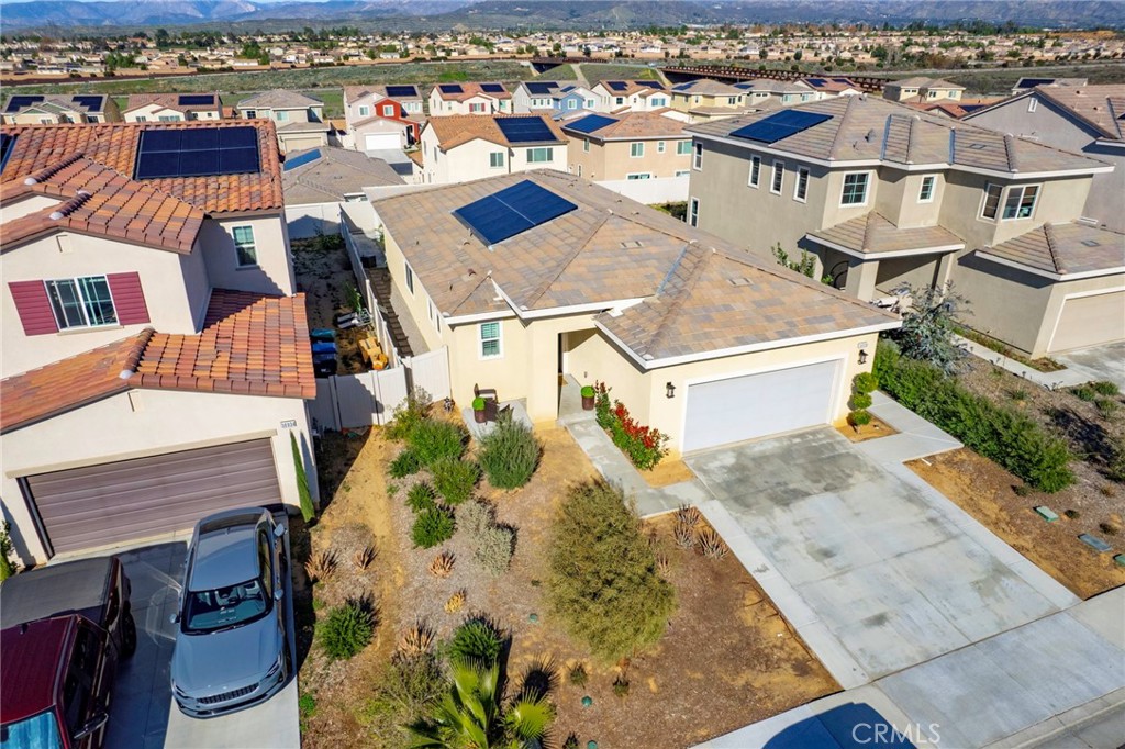 36938 Frantoio Street Beaumont, CA 92223 - Photo 4 of 35 an aerial view of a house with a yard