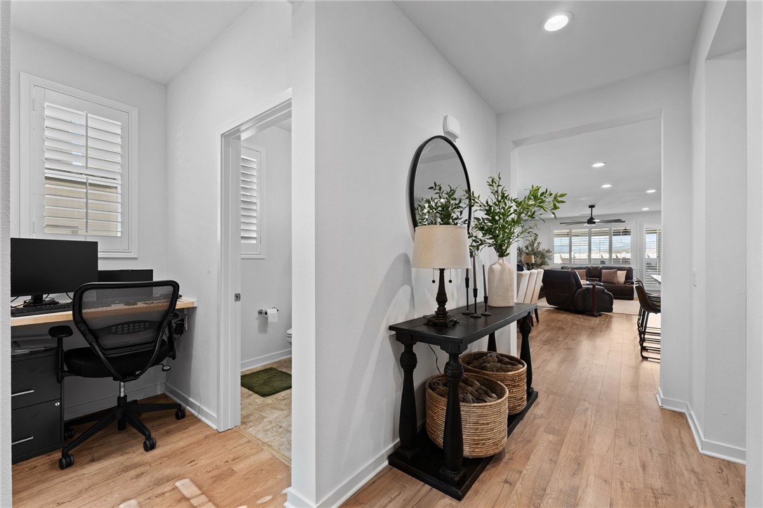 36938 Frantoio Street Beaumont, CA 92223 - Photo 9 of 35 a view of a livingroom with workspace and a window