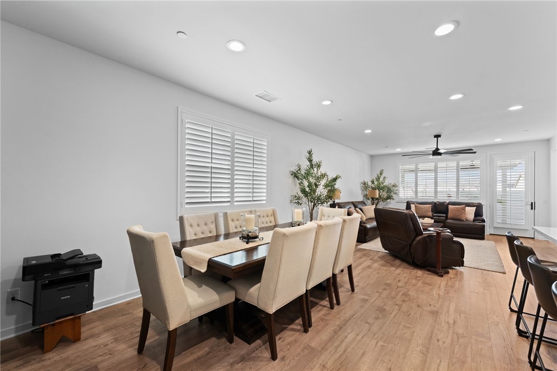 36938 Frantoio Street Beaumont, CA 92223 - Photo 10 of 35 a view of a dining room with furniture window and outside view