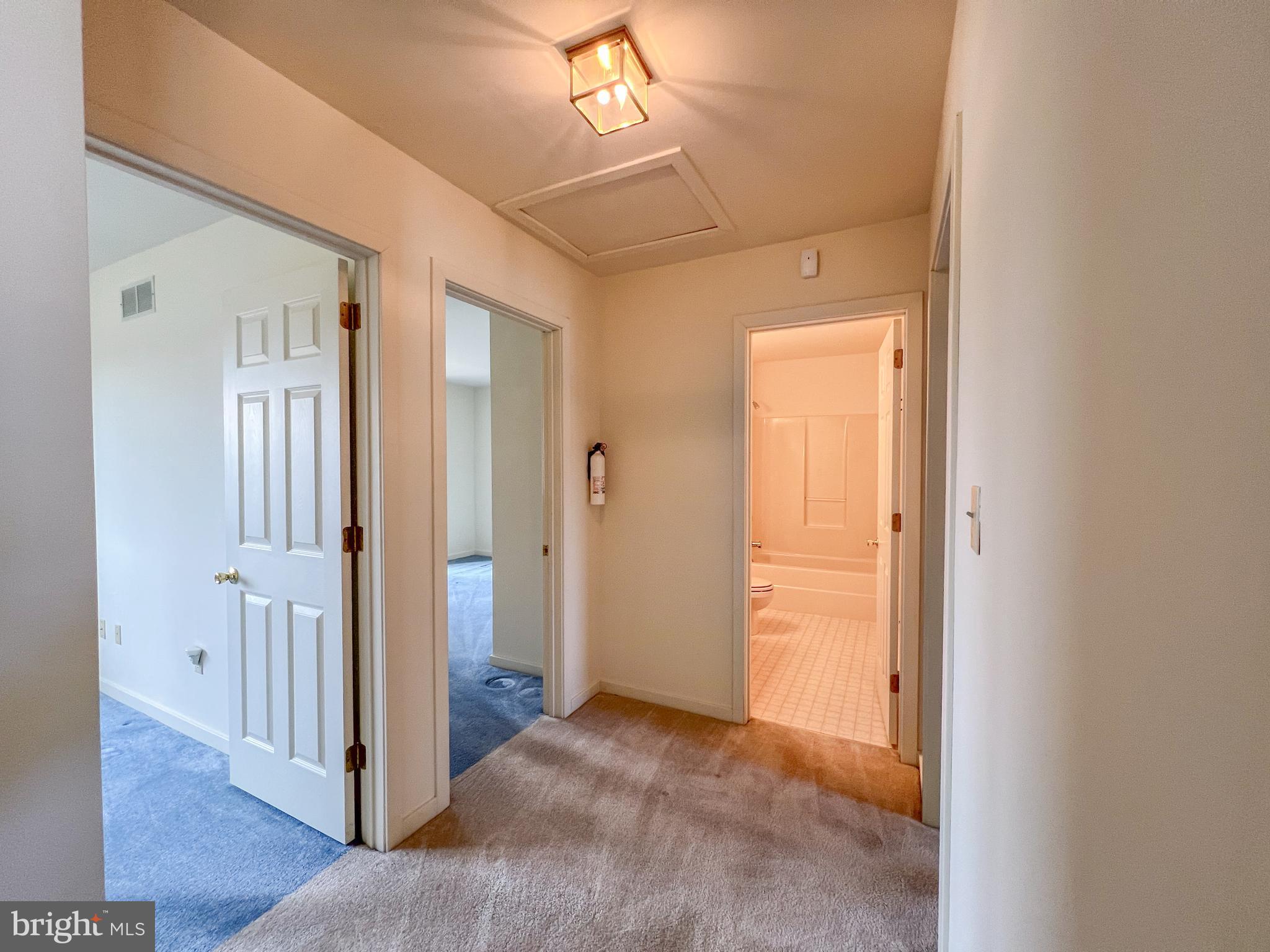 370 Chickory Way Newark, DE 19711 - Photo 18 of 36 a view of a hallway with wooden floor