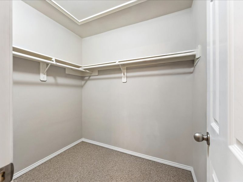 2915 Clay Street Houston, TX 77003 - Photo 12 of 15 Secondary bedroom walk-in closet offering versatile storage options.
