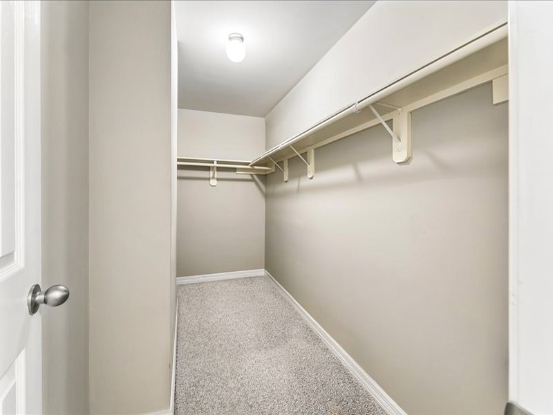 2915 Clay Street Houston, TX 77003 - Photo 9 of 15 Generous walk-in closet with built-in shelving and abundant storage space.