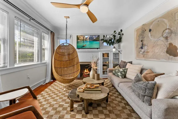a living room with furniture and a window