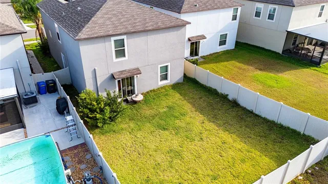 a view of an house with swimming pool