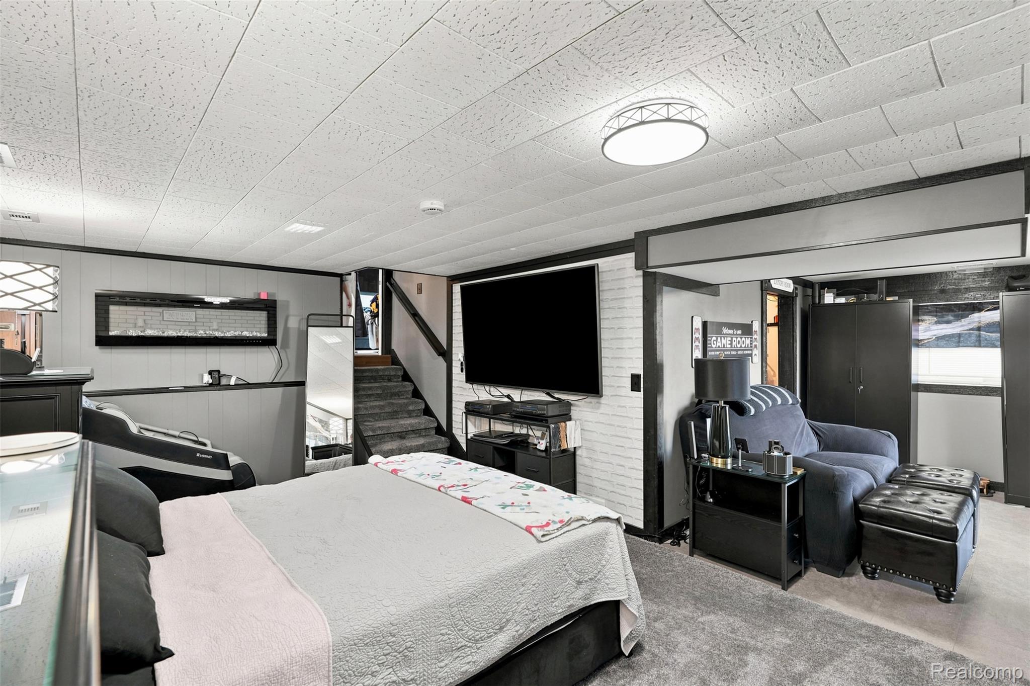 3744 Fish Lake Road Lapeer, MI 48446 - Photo 12 of 50 Spacious room featuring gray carpet flooring, white paneled ceiling, and recessed lighting