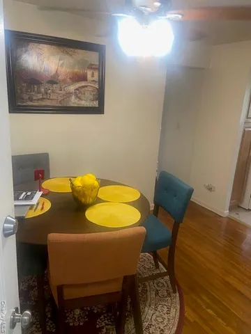 a room with a table and chairs