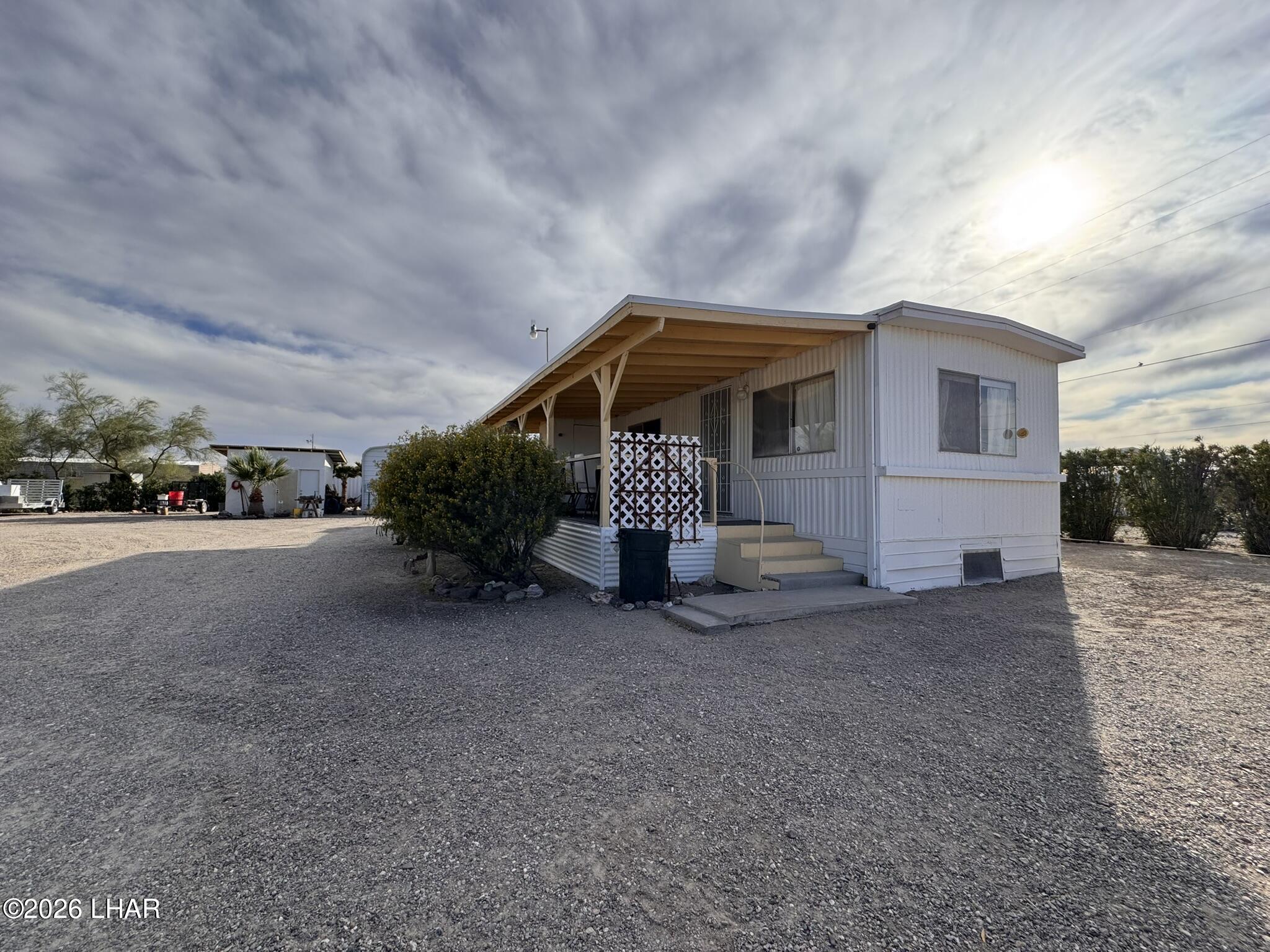587 West Pyramid Street Quartzsite, AZ 85346 - Photo 18 of 46 a view of a house with a street