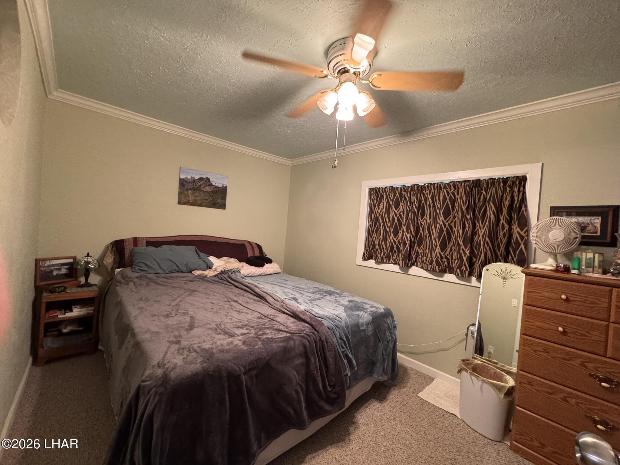 587 West Pyramid Street Quartzsite, AZ 85346 - Photo 26 of 46 a bedroom with a bed and a closet