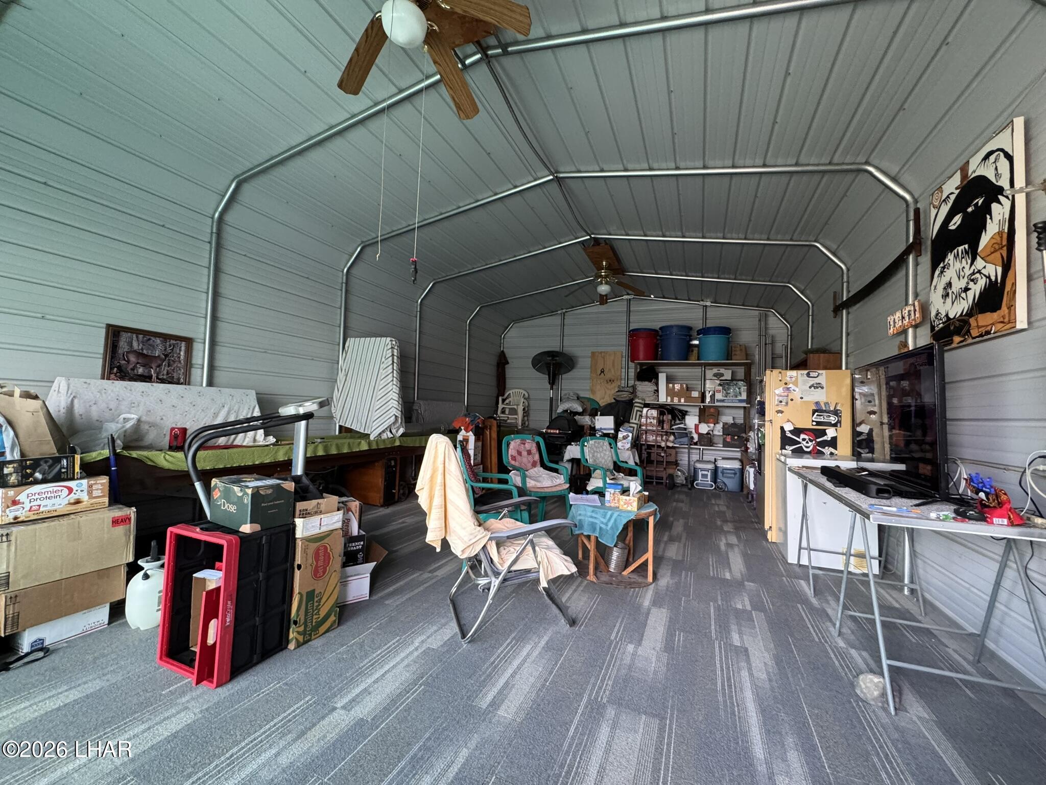 587 West Pyramid Street Quartzsite, AZ 85346 - Photo 43 of 46 a view of store room with furniture and wooden floor