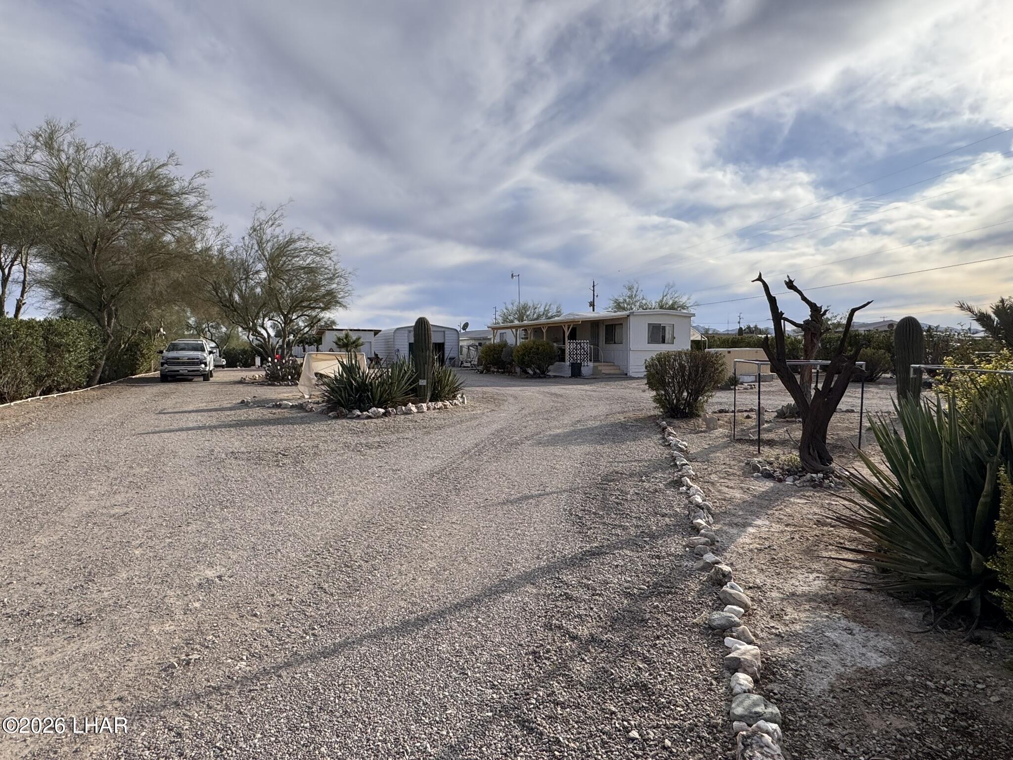587 West Pyramid Street Quartzsite, AZ 85346 - Photo 46 of 46 a view of a dry yard with trees