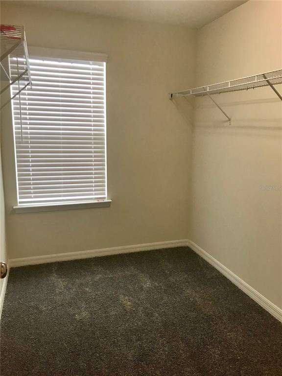 2680 Mead Avenue St. Cloud, FL 34771 - Photo 12 of 35 a view of an empty room with a window