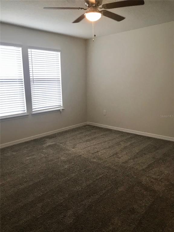 2680 Mead Avenue St. Cloud, FL 34771 - Photo 20 of 35 an empty room with a window