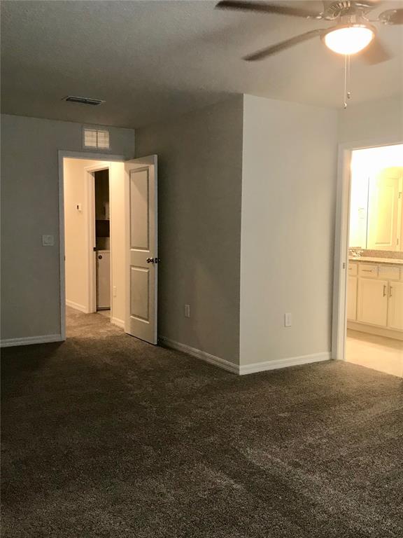 2680 Mead Avenue St. Cloud, FL 34771 - Photo 21 of 35 an empty room with closet and windows