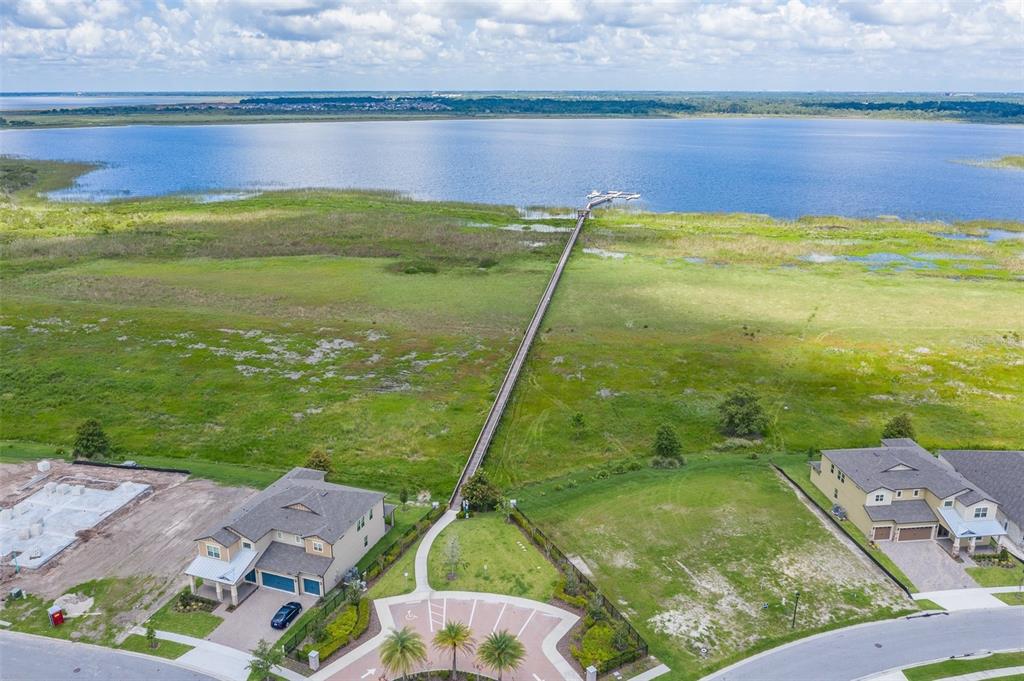 2680 Mead Avenue St. Cloud, FL 34771 - Photo 27 of 35 a view of a lake with a yard