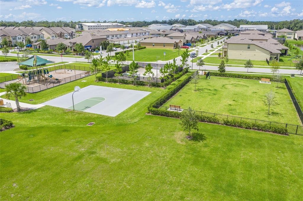 2680 Mead Avenue St. Cloud, FL 34771 - Photo 28 of 35 an aerial view of residential houses with outdoor space and swimming pool