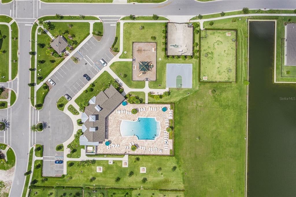 2680 Mead Avenue St. Cloud, FL 34771 - Photo 35 of 35 a bathroom with a sink mirror and vanity