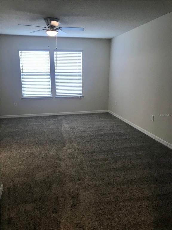 2680 Mead Avenue St. Cloud, FL 34771 - Photo 9 of 35 an empty room with a window