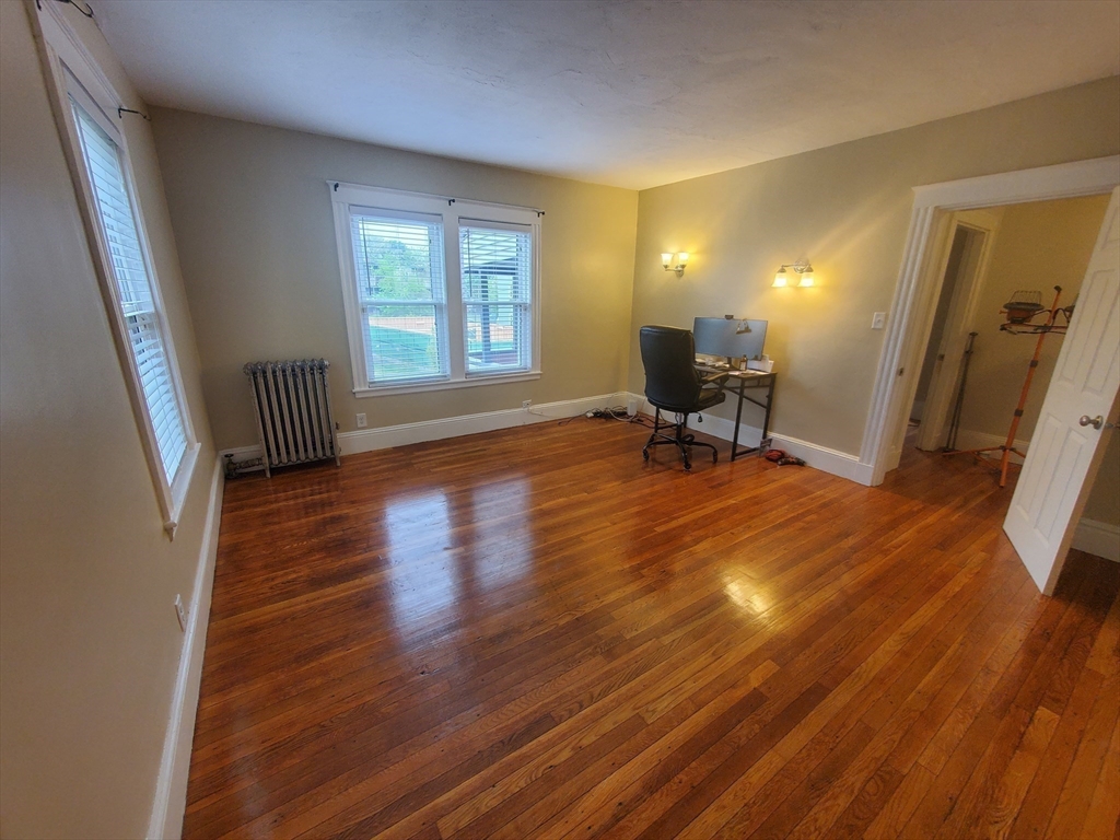 45 Intervale Street, Unit 2 Boston, MA 02121 - Photo 9 of 17 a view of a livingroom with wooden floor and a window