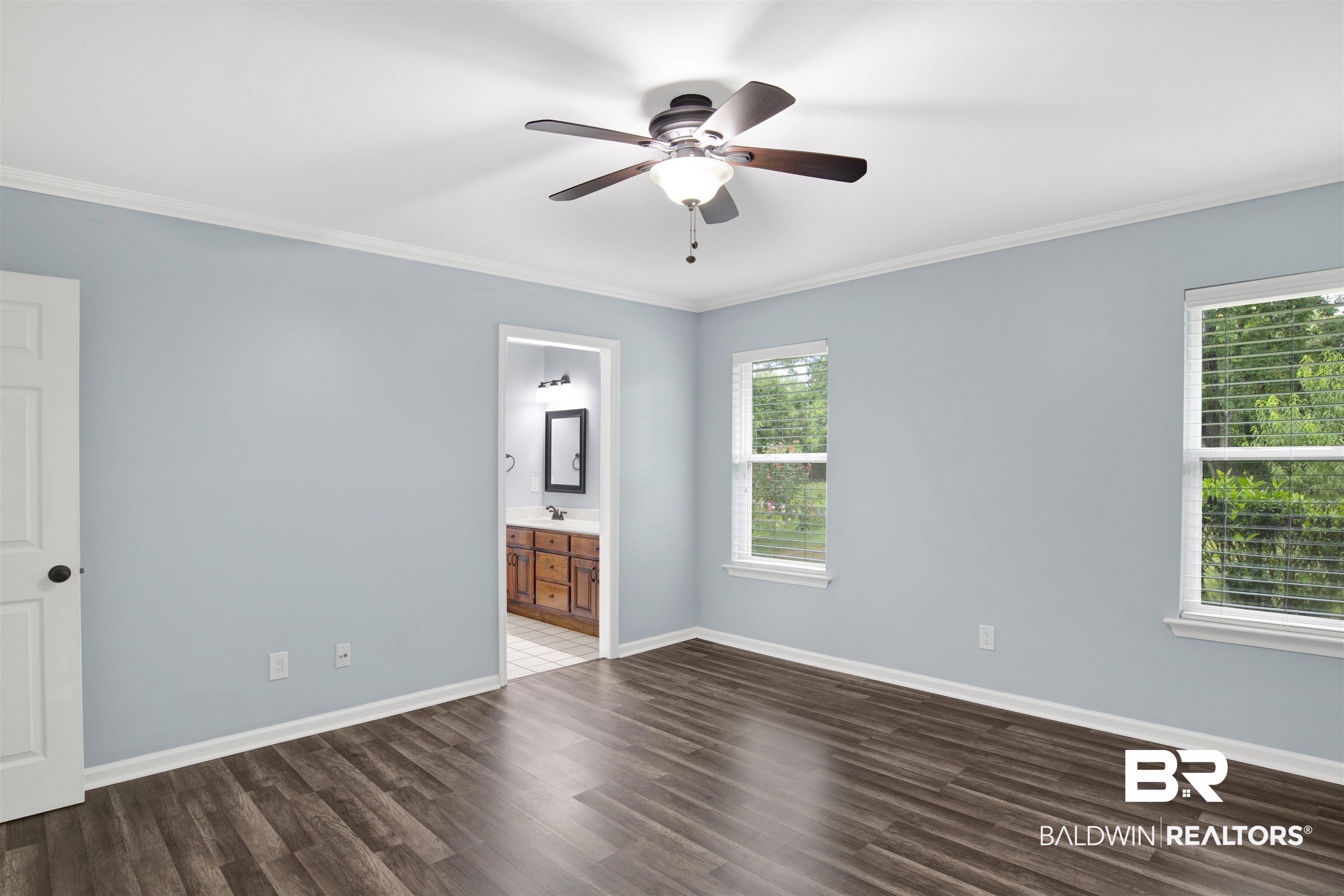 3011 Olde Gate Road Mobile, AL 36695 - Photo 23 of 35 Spare room with wood finished floors, crown molding, and a ceiling fan