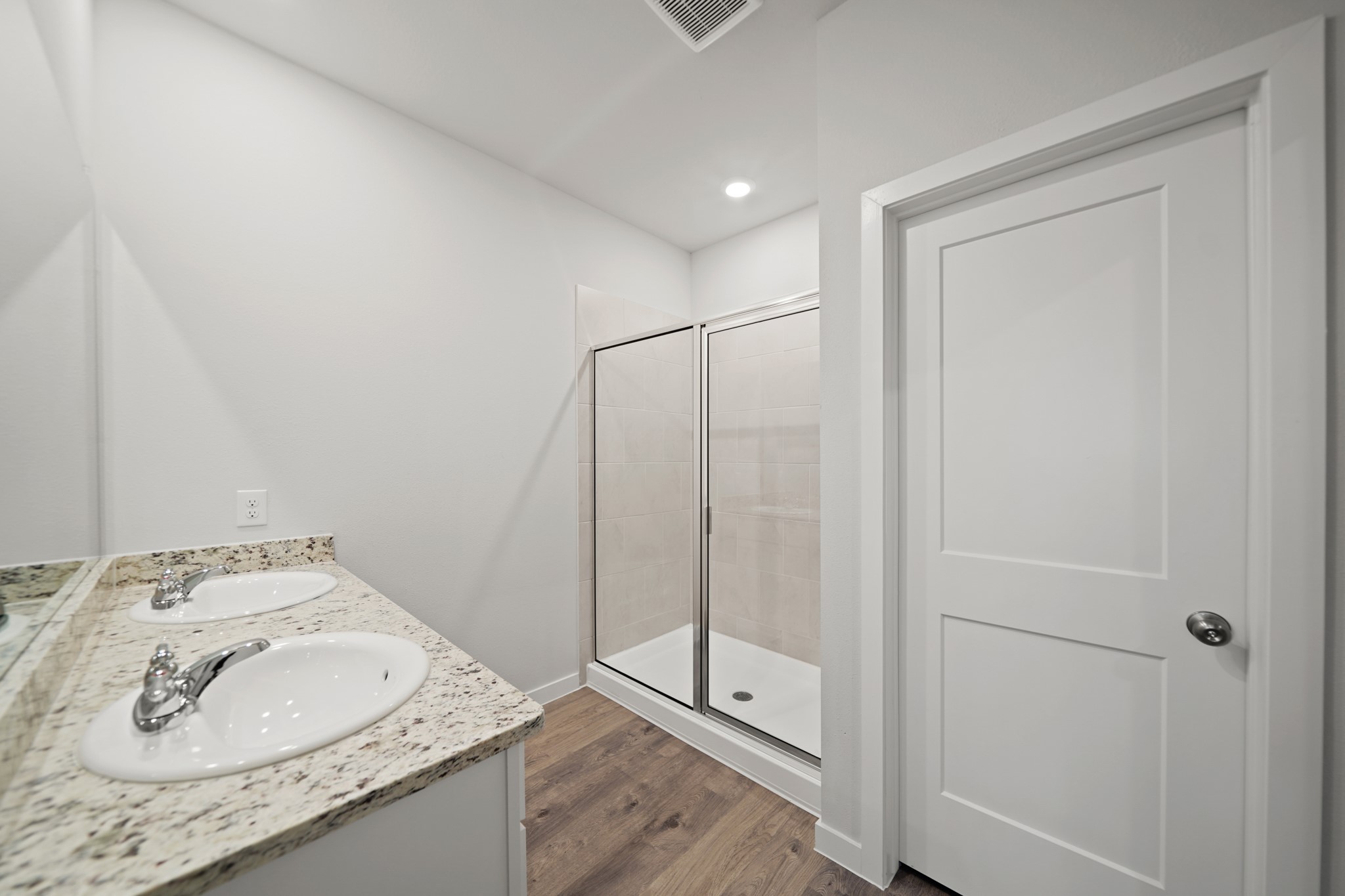 310 Amy Street Angleton, TX 77515 - Photo 12 of 26 a bathroom with a granite countertop sink and a mirror