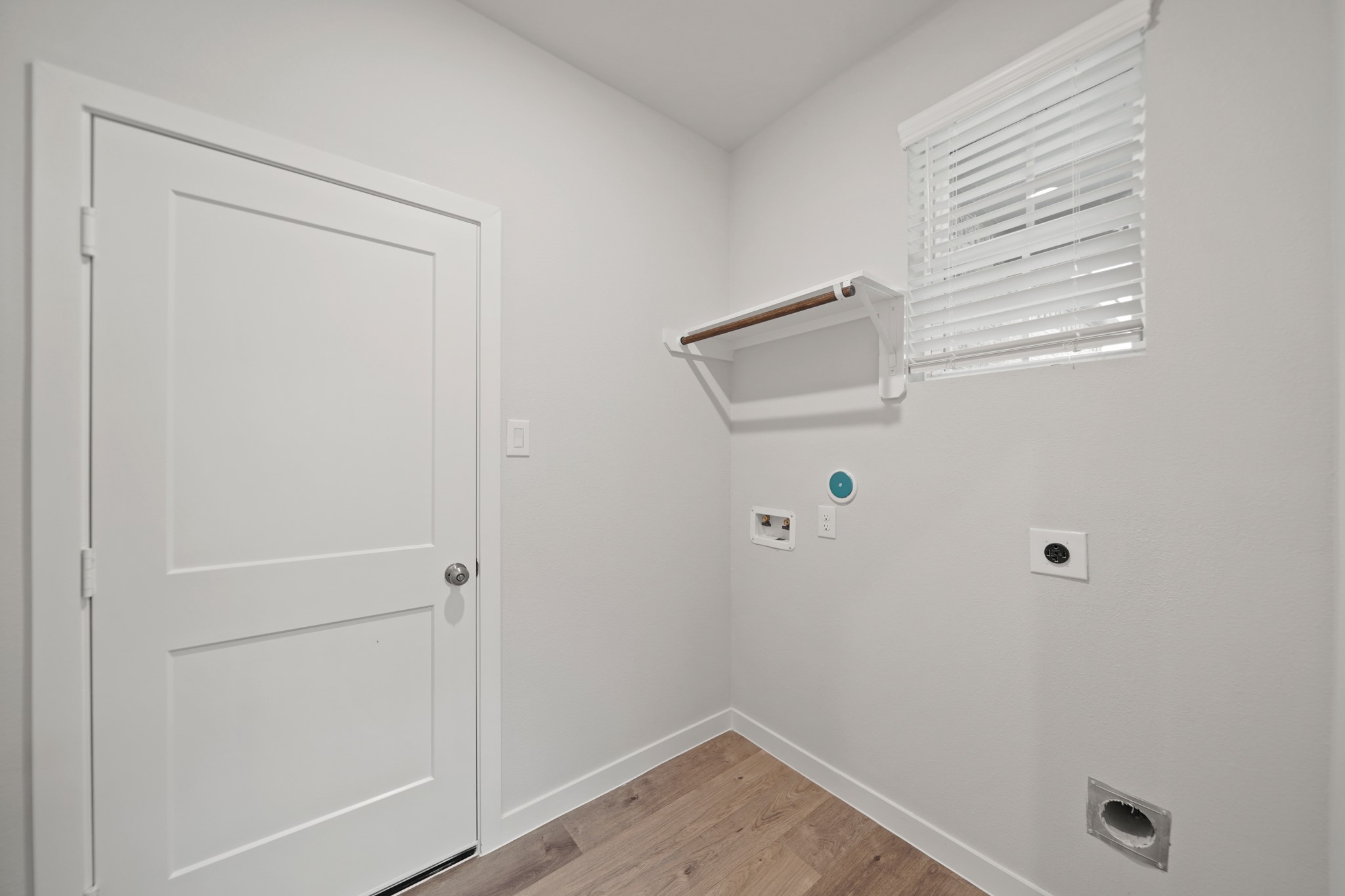 310 Amy Street Angleton, TX 77515 - Photo 4 of 26 a view of room with window