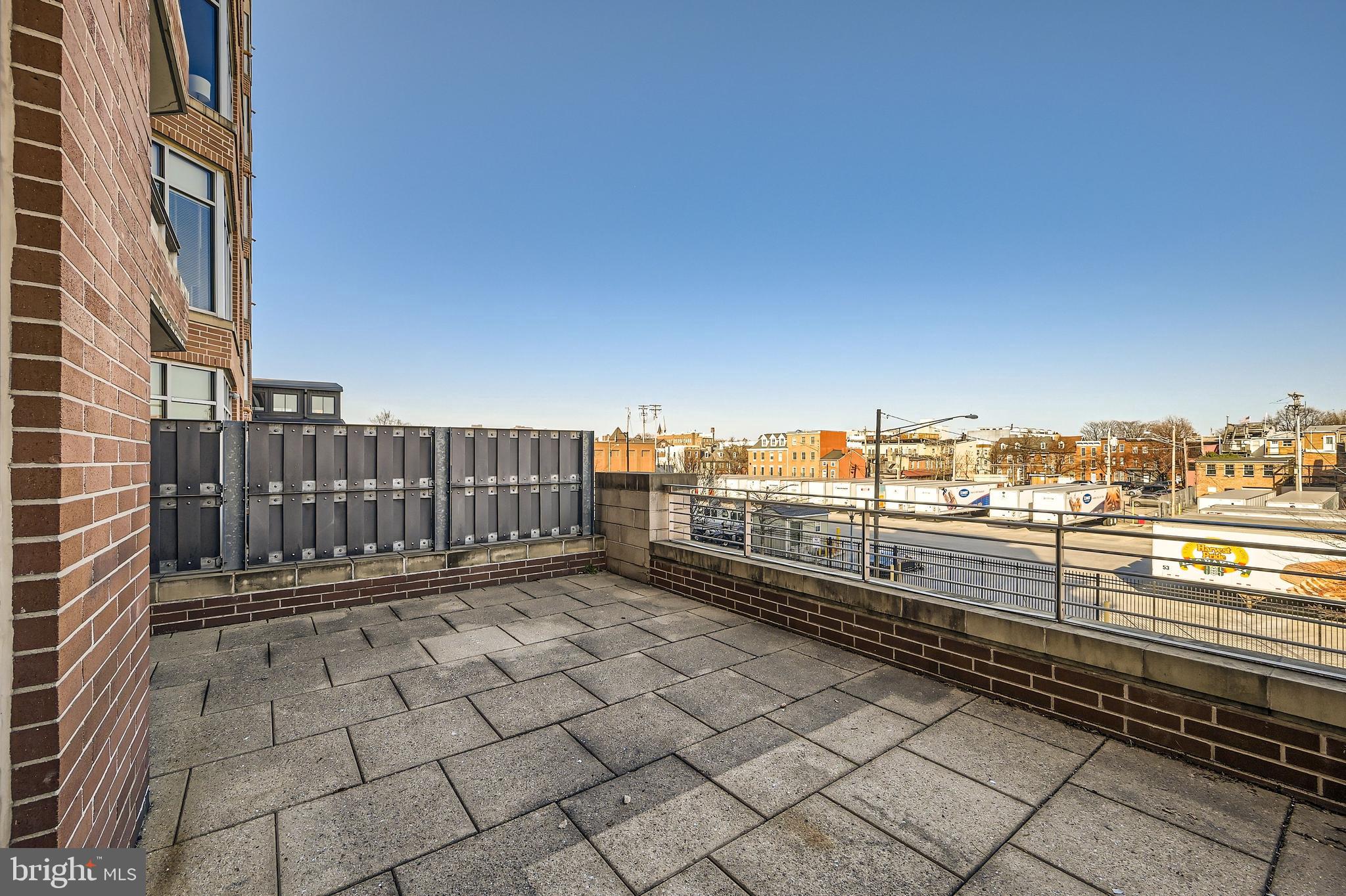1400 Lancaster Street, Unit 303 Baltimore, MD 21231 - Photo 24 of 36 a view of a yard with wooden fence