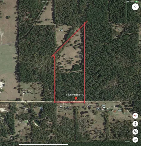 a view of a road with white house