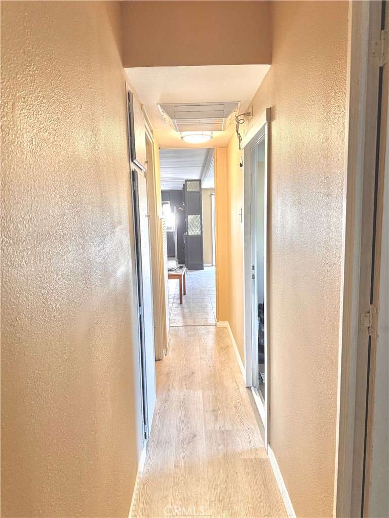 160 South Eucalyptus Avenue, Unit 60 Rialto, CA 92376 - Photo 7 of 7 a view of a hallway