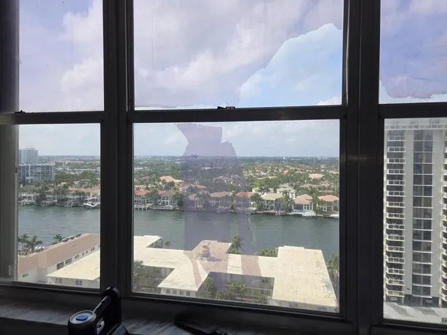 a view of a lake from a window