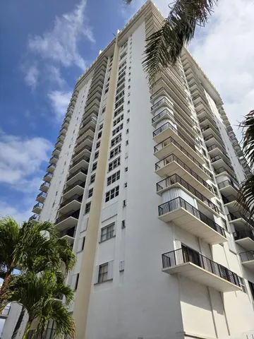 a view of a building with glass windows
