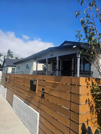 front view of a house with a street