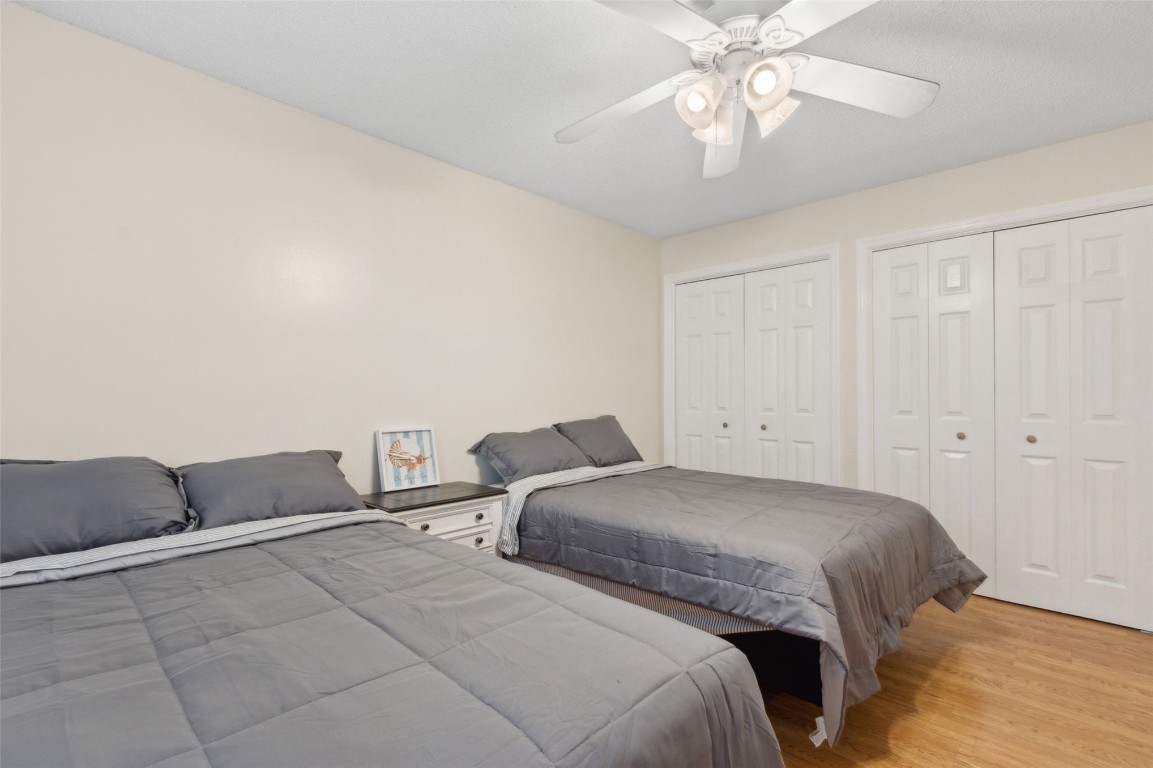2583 Forest Ridge Drive, Unit N3 Fernandina Beach, FL 32034 - Photo 21 of 34 a bedroom with a bed and a couch