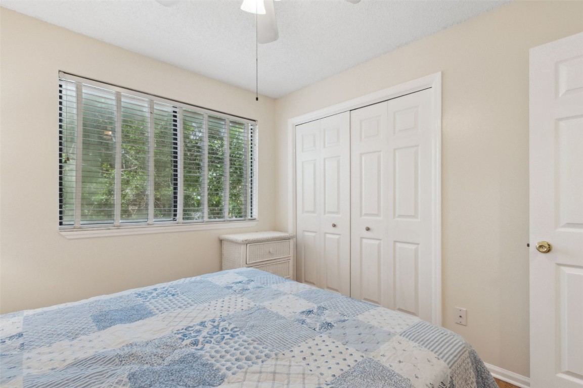 2583 Forest Ridge Drive, Unit N3 Fernandina Beach, FL 32034 - Photo 23 of 34 a bedroom with a bed and a window