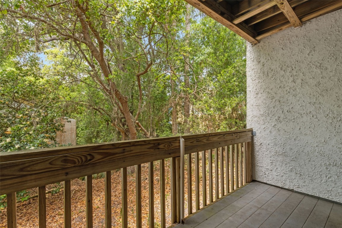 2583 Forest Ridge Drive, Unit N3 Fernandina Beach, FL 32034 - Photo 5 of 34 a view of a balcony with wooden floor