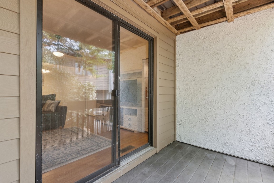 2583 Forest Ridge Drive, Unit N3 Fernandina Beach, FL 32034 - Photo 7 of 34 a view of a room with wooden floor and a glass door
