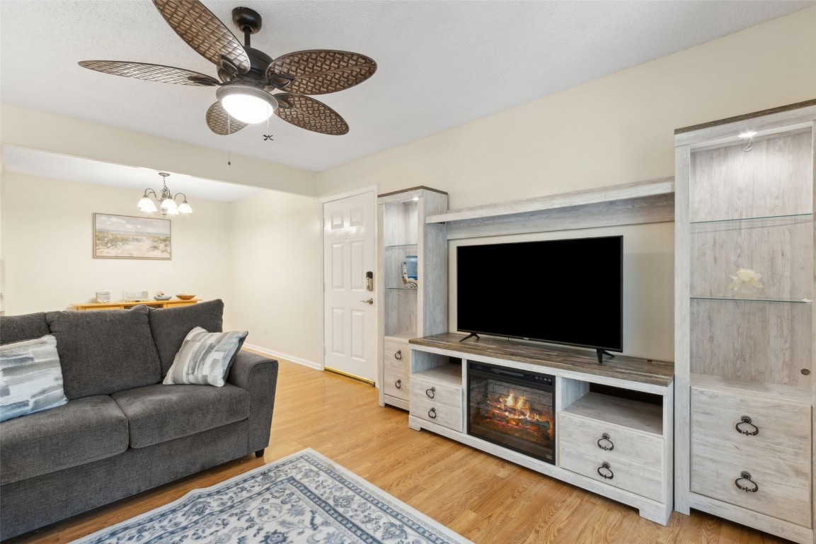 2583 Forest Ridge Drive, Unit N3 Fernandina Beach, FL 32034 - Photo 8 of 34 a living room with furniture and a flat screen tv