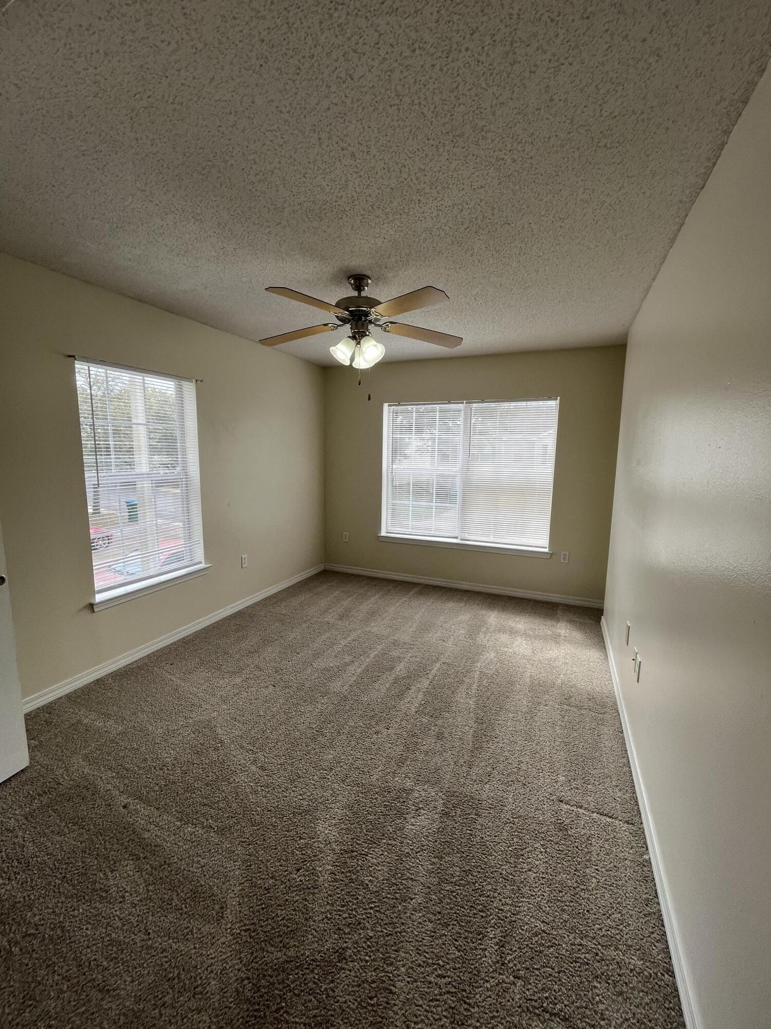 204 Johnson Court Crestview, FL 32536 - Photo 13 of 17 a view of an empty room with a window