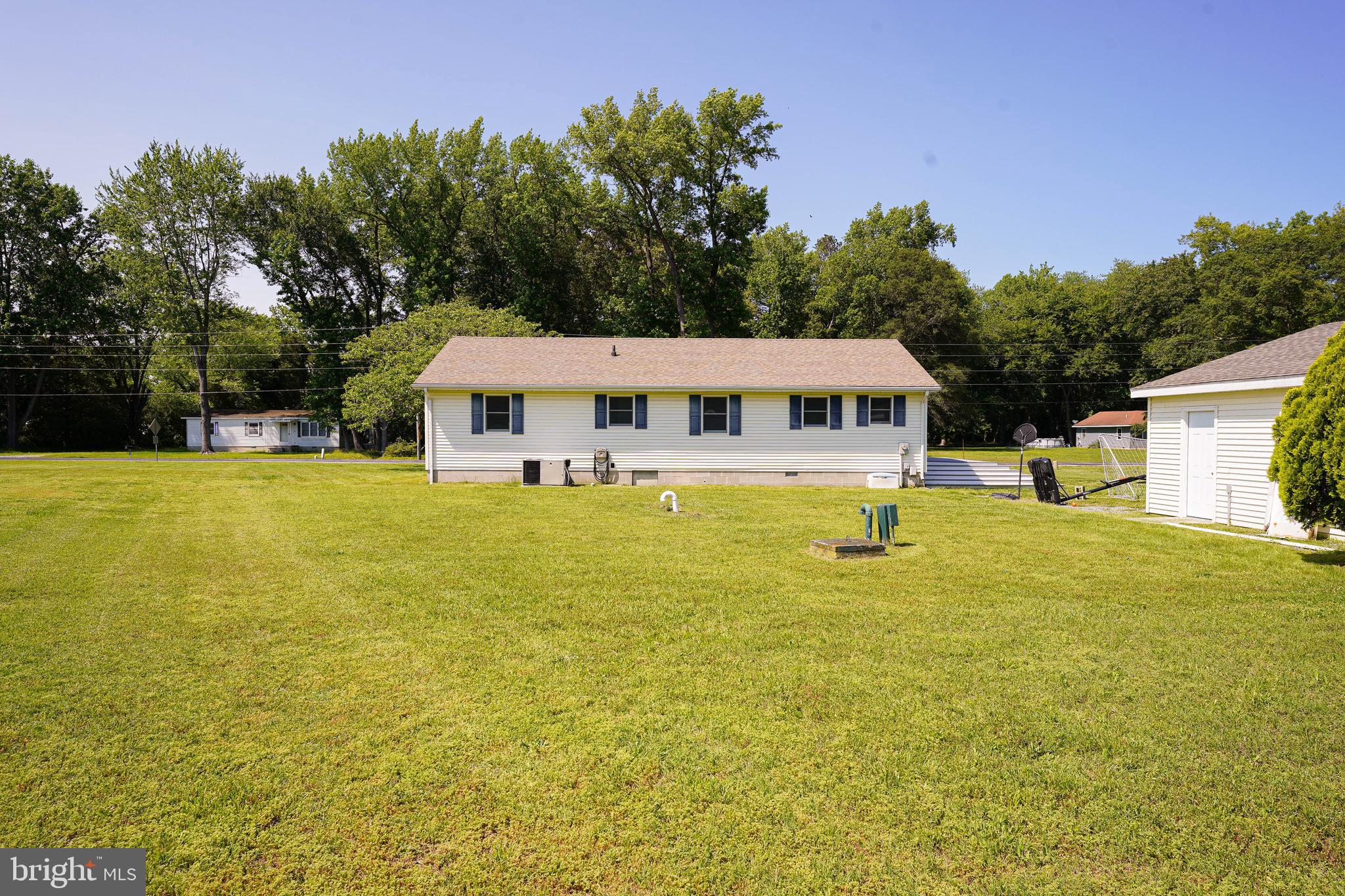 10564 Waller Road Laurel, DE 19956 - Photo 3 of 33 a view of a house with a swimming pool
