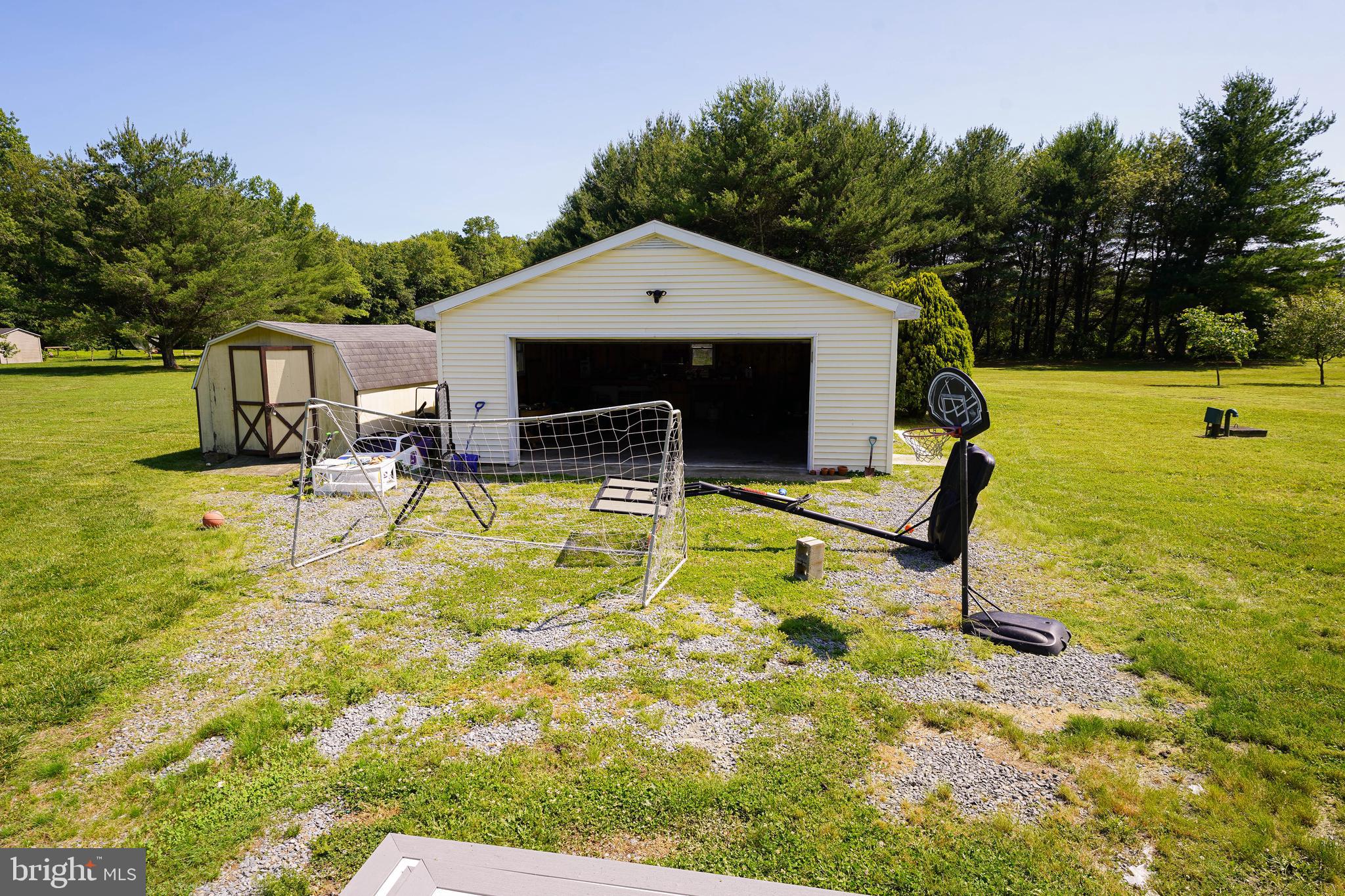 10564 Waller Road Laurel, DE 19956 - Photo 4 of 33 a swimming pool with outdoor seating and yard