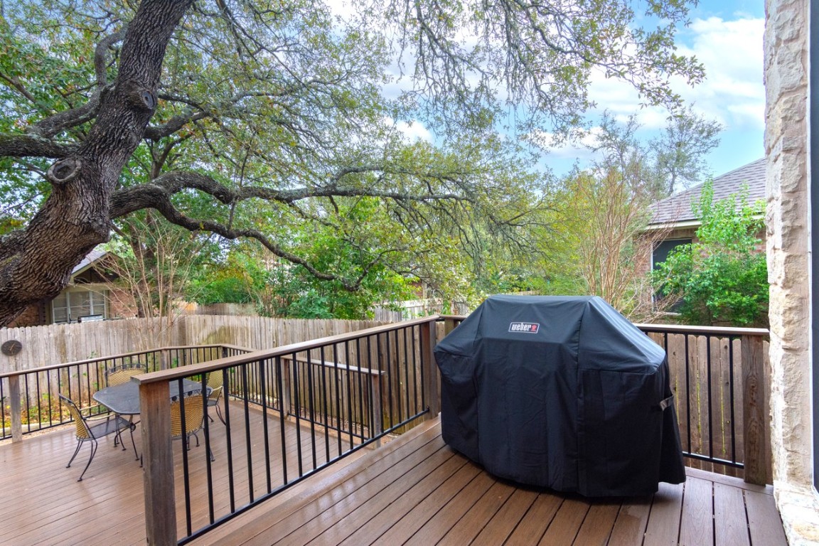 11401 Ohmfield Court Austin, TX 78739 - Photo 30 of 40 a view of balcony with wooden floor and outdoor seating