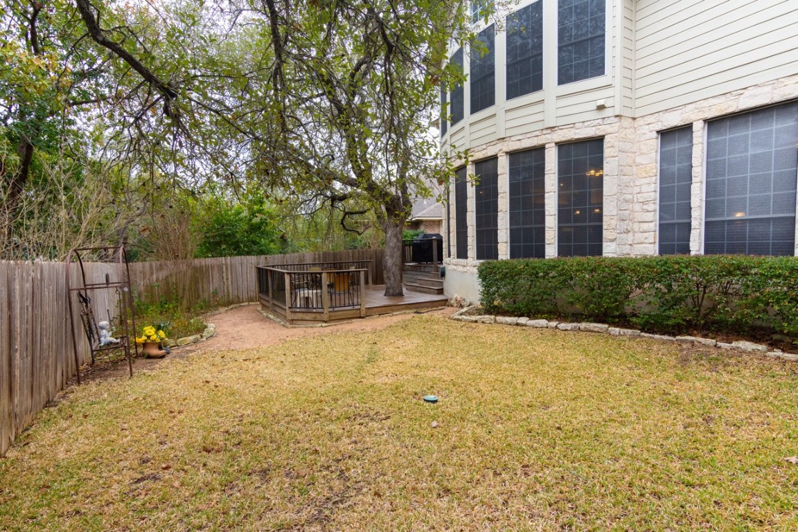 11401 Ohmfield Court Austin, TX 78739 - Photo 34 of 40 a view of a house with backyard and sitting area